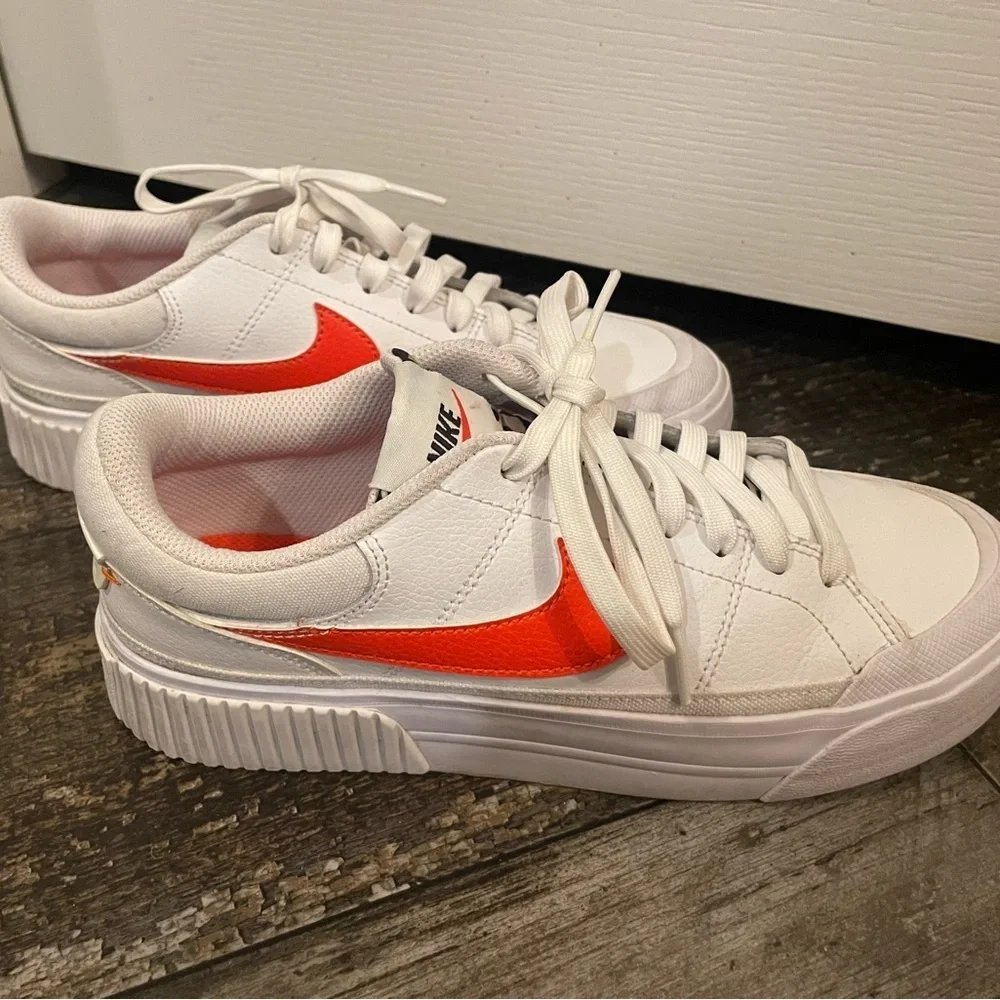 Women’s White and Orange Leopard Nikes sz 7.5 EUC